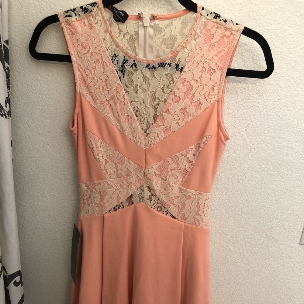 Bebe coral and lace dress. Size 2. NWT